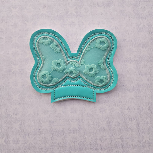 Teal embroidered flowers